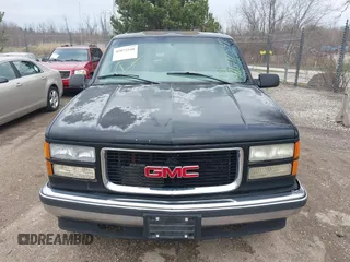 1998 GMC Yukon with VIN 1GKEK13R9WJ734112, listed as a IAAI auction lot 42072548 with 226,061 mi miles. Bid and sale history available at carsss.com. Image 6.