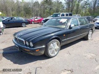 1996 Jaguar XJ Series Sedan Vanden Plas with VIN SAJKX6245TC780444, listed as a IAAI auction lot 41856403 with NaN miles. Bid and sale history available at carsss.com. Image 2.