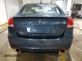 2009 Pontiac G8 with VIN 6G2ER57789L161792, listed as a Copart auction lot 43455795 with 127,236 mi miles and Salvage Title. Bid and sale history available at DreamBid. Image 6.