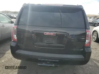 2019 GMC Yukon SLE with VIN 1GKS1AKC2KR101675, listed as a Copart auction lot 87256804 with 144,572 mi miles and Salvage Title. Bid and sale history available at carsss.com. Image 6.