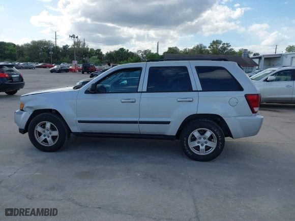2007 Jeep Grand Cherokee Laredo with VIN 1J8GS48K17C507013, listed as a IAAI auction lot 41702347 with 178,119 mi miles. Bid and sale history available at carsss.com. Image 14.