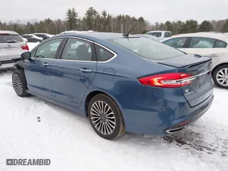 2018 Ford Fusion Titanium with VIN 3FA6P0D91JR219894, listed as a IAAI auction lot 41544449 with 100,406 mi miles. Bid and sale history available at carsss.com. Image 3.
