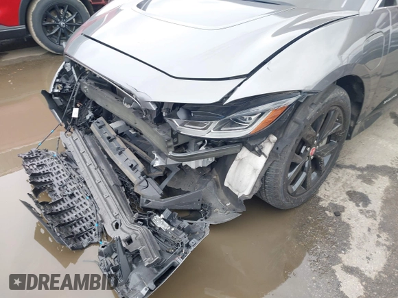 2020 Jaguar I-Pace SE with VIN SADHC2S13L1F79454, listed as a IAAI auction lot 41728860 with 32,035 mi miles and . Bid and sale history available at DreamBid. Image 6.
