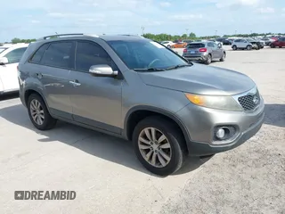 2011 Kia Sorento EX with VIN 5XYKU4A10BG113603, listed as a IAAI auction lot 42123052 with 238,437 mi miles. Bid and sale history available at carsss.com. Image 1.