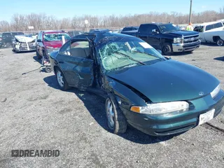 1999 Oldsmobile Intrigue GL z VIN 1G3WS52K0XF301908, wystawiony jako IAAI lot #41748145 z przebiegiem 76 899 mil mil oraz . Historia ofert i sprzedaży dostępna na DreamBid. Obrazek 1.