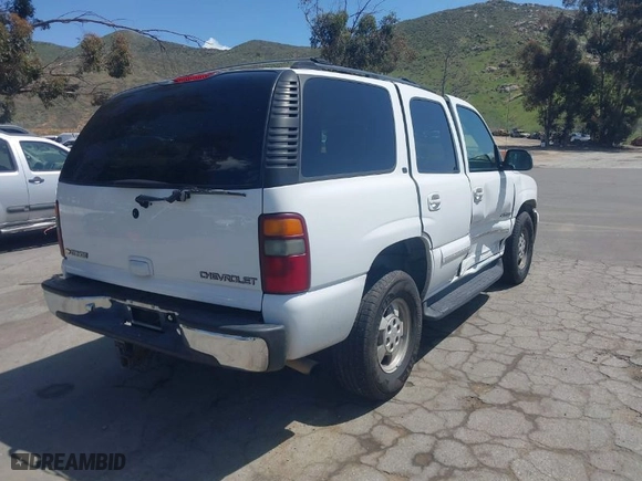 2002 Chevrolet Tahoe LS with VIN 1GNEC13T22R232615, listed as a IAAI auction lot 41965606 with 199,202 mi miles. Bid and sale history available at carsss.com. Image 4.
