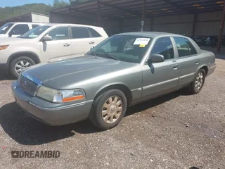 2003 Mercury Grand Marquis LS Premium z VIN 2MEFM75W53X691700, wystawiony jako IAAI lot #41952048 z przebiegiem 208 747 mil mil oraz . Historia ofert i sprzedaży dostępna na DreamBid. Obrazek 2.