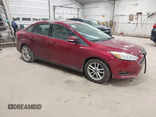2015 Ford Focus SE with VIN 1FADP3F21FL270827, listed as a IAAI auction lot 42665015 with 162,745 mi miles and . Bid and sale history available at DreamBid. Image 1.
