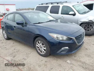 2014 Mazda 3 i Grand Touring with VIN JM1BM1M77E1133477, listed as a IAAI auction lot 41861051 with 124,377 mi miles and . Bid and sale history available at DreamBid. Image 1.