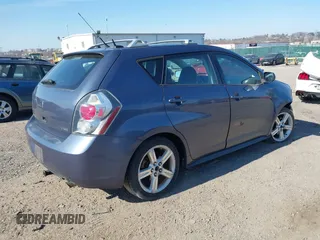 2009 Pontiac Vibe w/1SB with VIN 5Y2SL67059Z423173, listed as a IAAI auction lot 41779483 with 108,896 mi miles. Bid and sale history available at carsss.com. Image 4.