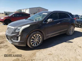2017 Cadillac XT5 Platinum AWD with VIN 1GYKNFRS6HZ138810, listed as a Copart auction lot 48029455 with 97,948 mi miles and Salvage Title. Bid and sale history available at carsss.com. Image 1.