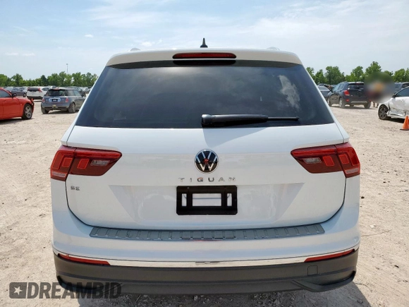 2023 Volkswagen Tiguan SE with VIN 3VV3B7AX7PM117286, listed as a Copart auction lot 57418985 with 21,162 mi miles and Salvage title. Bid and sale history available at DreamBid. Image 6.