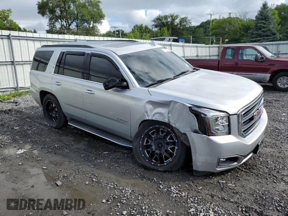 2015 GMC Yukon SLT with VIN 1GKS2BKC9FR518381, listed as a Copart auction lot 66352864 with 103,419 mi miles and Salvage Title. Bid and sale history available at DreamBid. Image 4.