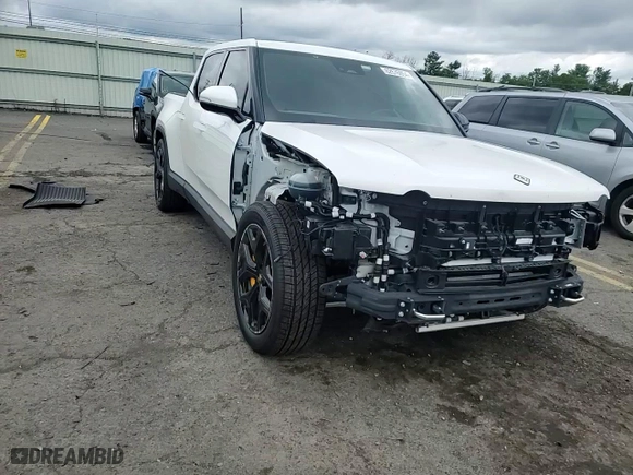 2022 Rivian R1T Adventure Package with VIN 7FCTGAAA3NN015635, listed as a Copart auction lot 62676854 with 10,608 mi miles and Salvage Title. Bid and sale history available at carsss.com. Image 11.