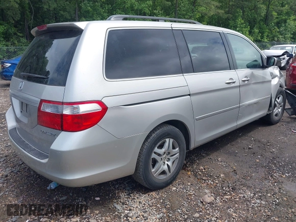 2005 Honda Odyssey EX-L z VIN 5FNRL38695B036836, wystawiony jako IAAI lot #42369670 z przebiegiem 222 061 mil mil oraz . Historia ofert i sprzedaży dostępna na DreamBid. Obrazek 4.