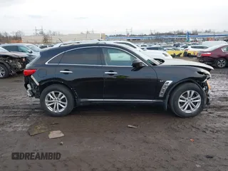 2015 Infiniti QX70 with VIN JN8CS1MW2FM480768, listed as a IAAI auction lot 41229824 with 149,146 mi miles and . Bid and sale history available at DreamBid. Image 13.