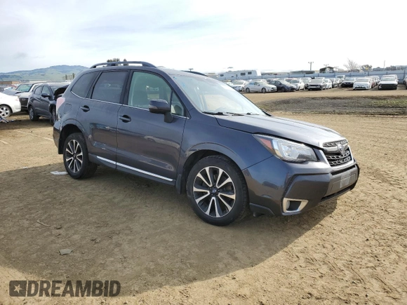 2018 Subaru Forester Touring with VIN JF2SJGWC0JH492548, listed as a Copart auction lot 49763305 with 74,382 mi miles and Salvage Title. Bid and sale history available at carsss.com. Image 4.