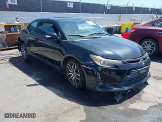 2014 Scion tC with VIN JTKJF5C71E3072199, listed as a IAAI auction lot 41956178 with 154,730 mi miles. Bid and sale history available at carsss.com. Image 1.