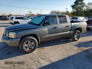 2006 Dodge Dakota SLT with VIN 1D7HW48K46S624630, listed as a Copart auction lot 76592394 with 135,679 mi miles and Salvage Title. Bid and sale history available at carsss.com. Image 1.