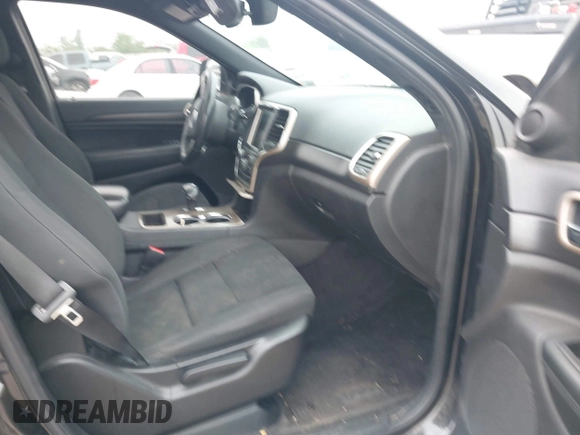 2015 Jeep Grand Cherokee Altitude with VIN 1C4RJEAG3FC944427, listed as a IAAI auction lot 41929483 with 128,114 mi miles. Bid and sale history available at carsss.com. Image 5.