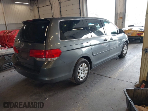 2008 Honda Odyssey LX with VIN 5FNRL38258B064490, listed as a IAAI auction lot 42228533 with 126,043 mi miles and . Bid and sale history available at DreamBid. Image 4.