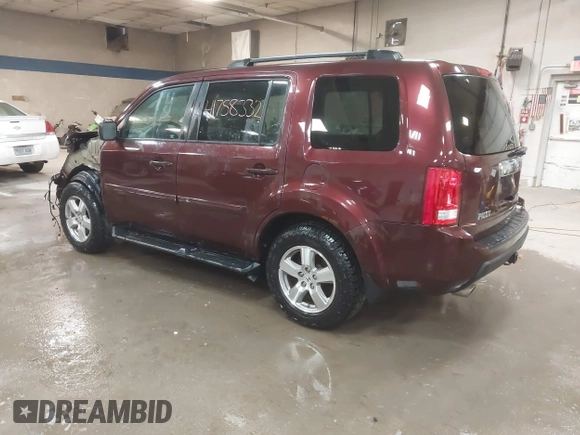 2011 Honda Pilot EX-L with VIN 5FNYF4H56BB051404, listed as a IAAI auction lot 41758332 with 301,099 mi miles. Bid and sale history available at carsss.com. Image 3.