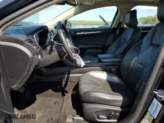 2020 Ford Fusion Plug-In Hybrid Titanium with VIN 3FA6P0SUXLR101997, listed as a Copart auction lot 69575324 with 74,121 mi miles and Salvage Title. Bid and sale history available at carsss.com. Image 7.