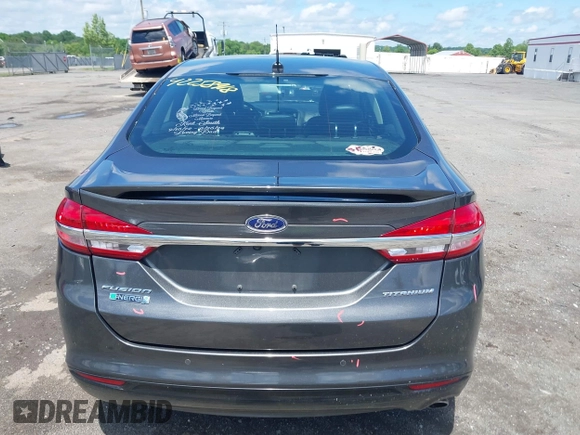 2017 Ford Fusion Titanium z VIN 3FA6P0SUXHR184919, wystawiony jako IAAI lot #42258918 z przebiegiem Nie podano mil oraz . Historia ofert i sprzedaży dostępna na DreamBid. Obrazek 17.