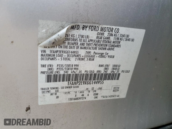2016 Ford Taurus SEL with VIN 1FAHP2E9XGG144955, listed as a Copart auction lot 82207634 with 128,823 mi miles and Salvage Title. Bid and sale history available at DreamBid. Image 13.