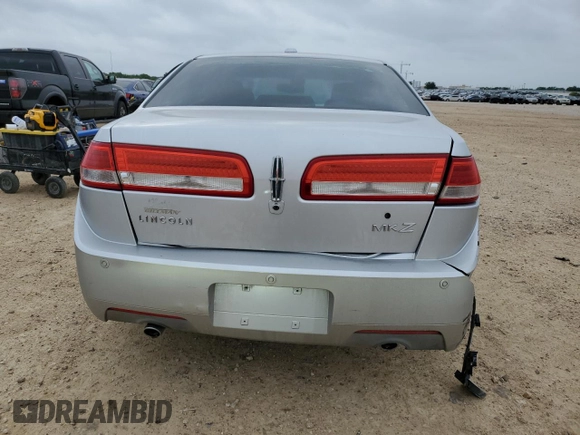 2011 Lincoln MKZ с VIN 3LNHL2GC7BR764304, выставлен на аукционе Copart как лот 55140005 с пробегом 128 062 миль миль и Списание • Salvage title. История ставок и продаж доступна на DreamBid. Изображение 6.