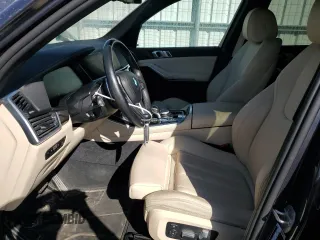 2020 BMW X5 xDrive40i with VIN 5UXCR6C06LLL75359, listed as a Copart auction lot 60897885 with 66,631 mi miles and Salvage title. Bid and sale history available at DreamBid. Image 7.
