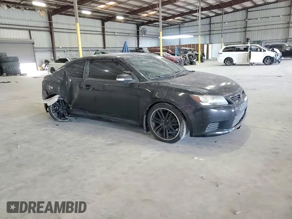 2013 Scion tC z VIN JTKJF5C75D3058143, wystawiony jako Copart lot #58116405 z przebiegiem 242 201 mil mil oraz Szkoda całkowita • Salvage title. Historia ofert i sprzedaży dostępna na DreamBid. Obrazek 13.