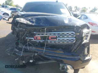 2019 GMC Sierra 1500 Denali z VIN 1GTU9FEL8KZ173809, wystawiony jako IAAI lot #42363300 z przebiegiem 75 425 mil mil oraz . Historia ofert i sprzedaży dostępna na DreamBid. Obrazek 6.