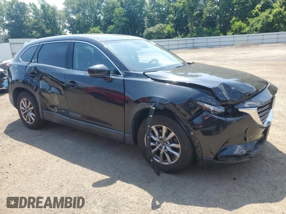 2019 Mazda CX-9 Touring with VIN JM3TCACY8K0301086, listed as a Copart auction lot 62193975 with 54,149 mi miles and Salvage title. Bid and sale history available at DreamBid. Image 4.