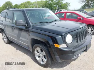 2014 Jeep Patriot Latitude with VIN 1C4NJRFB1ED761863, listed as a IAAI auction lot 42524407 with 148,866 mi miles and . Bid and sale history available at DreamBid. Image 1.