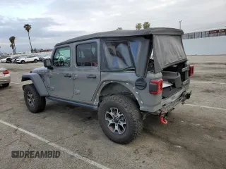 2022 Jeep Wrangler Unlimited Rubicon with VIN 1C4HJXFGXNW158038, listed as a Copart auction lot 53020575 with 14,355 mi miles and Salvage title. Bid and sale history available at DreamBid. Image 2.