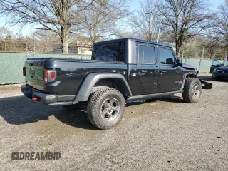 2020 Jeep Gladiator Rubicon z VIN 1C6JJTBG9LL184085, wystawiony jako Copart lot #51382115 z przebiegiem 83 375 mil mil oraz Szkoda całkowita • Salvage title. Historia ofert i sprzedaży dostępna na DreamBid. Obrazek 3.