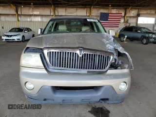2004 Lincoln Aviator Luxury z VIN 5LMEU68HX4ZJ09938, wystawiony jako Copart lot #52117635 z przebiegiem 147 801 mil mil oraz Szkoda całkowita • Salvage title. Historia ofert i sprzedaży dostępna na DreamBid. Obrazek 5.