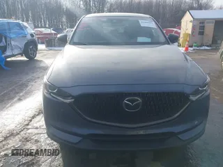 2021 Mazda CX-5 Touring z VIN JM3KFBCMXM0463469, wystawiony jako IAAI lot #41488993 z przebiegiem 28 582 mil mil oraz . Historia ofert i sprzedaży dostępna na DreamBid. Obrazek 12.