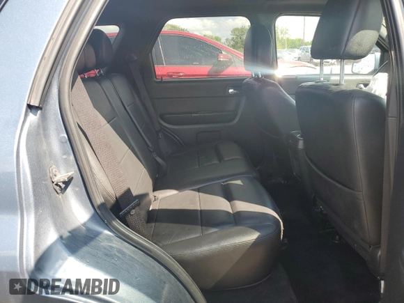 2010 Ford Escape Limited z VIN 1FMCU0EG4AKA45791, wystawiony jako Copart lot #67594483 z przebiegiem 189 470 mil mil oraz Szkoda całkowita • Salvage title. Historia ofert i sprzedaży dostępna na DreamBid. Obrazek 10.