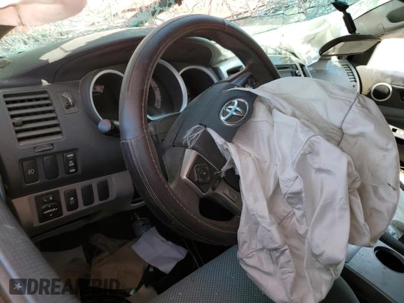 2014 Toyota Tacoma PreRunner с VIN 3TMKU4HN4EM041014, выставлен на аукционе Copart как лот 59615425 с пробегом Не указан миль и Списание • Salvage title. История ставок и продаж доступна на DreamBid. Изображение 8.