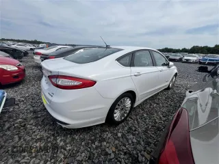 2015 Ford Fusion SE Hybrid с VIN 3FA6P0LU2FR120126, выставлен на аукционе Copart как лот 57130185 с пробегом 55 792 миль миль и Чистый • Clean title. История ставок и продаж доступна на DreamBid. Изображение 3.