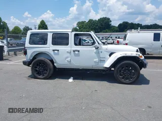 2024 Jeep Wrangler Sahara with VIN 1C4RJXP64RW270463, listed as a IAAI auction lot 42598295 with 36,251 mi miles and . Bid and sale history available at DreamBid. Image 13.