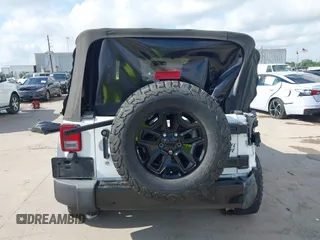 2015 Jeep Wrangler Willys Wheeler with VIN 1C4AJWAG0FL562536, listed as a IAAI auction lot 42384747 with 103,507 mi miles and . Bid and sale history available at DreamBid. Image 16.