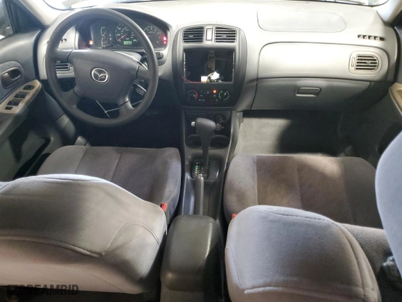 2000 Mazda Protege ES with VIN JM1BJ2216Y0199042, listed as a Copart auction lot 52282505 with 177,868 mi miles and Salvage Title. Bid and sale history available at carsss.com. Image 8.