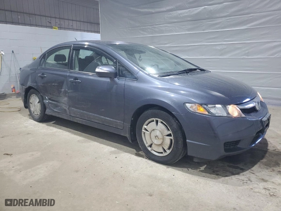 2010 Honda Civic Hybrid with VIN JHMFA3F27AS000535, listed as a Copart auction lot 46923655 with 75,344 mi miles and Salvage Title. Bid and sale history available at carsss.com. Image 4.