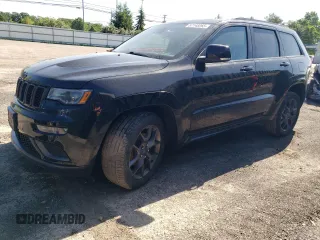 2019 Jeep Grand Cherokee Limited with VIN 1C4RJFBGXKC843402, listed as a Copart auction lot 57148265 with 96,615 mi miles and Salvage title. Bid and sale history available at DreamBid. Image 1.