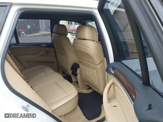 2009 BMW X5 30i with VIN 5UXFE43569L275733, listed as a IAAI auction lot 41897558 with 154,192 mi miles. Bid and sale history available at carsss.com. Image 8.