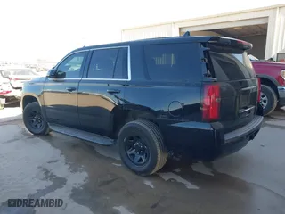 2018 Chevrolet Tahoe Commercial with VIN 1GNSKDEC8JR351269, listed as a IAAI auction lot 41602443 with 79,970 mi miles. Bid and sale history available at carsss.com. Image 3.