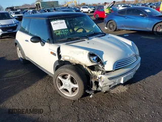 2004 MINI Hardtop with VIN WMWRC33464TJ58388, listed as a IAAI auction lot 40827409 with 102,322 mi miles and . Bid and sale history available at DreamBid. Image 6.